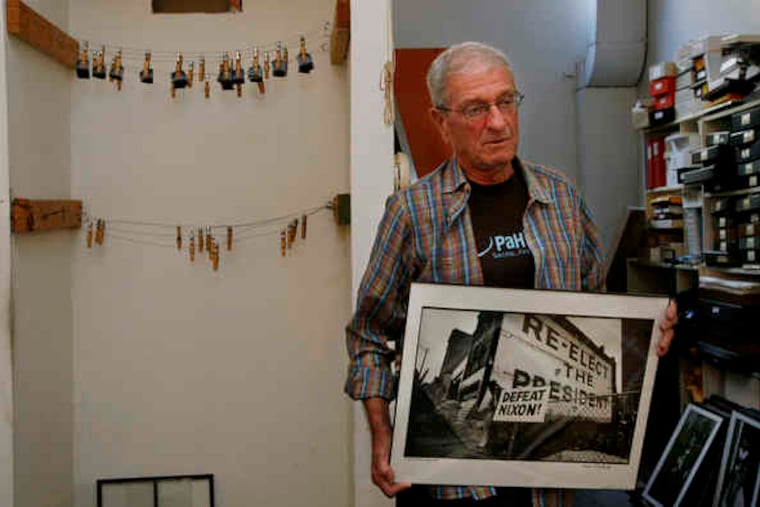 Harvey Finkle, 75, prepares for the exhibition of his work that will accompany Thursday's tribute to him by the Bread & Roses Community Fund.