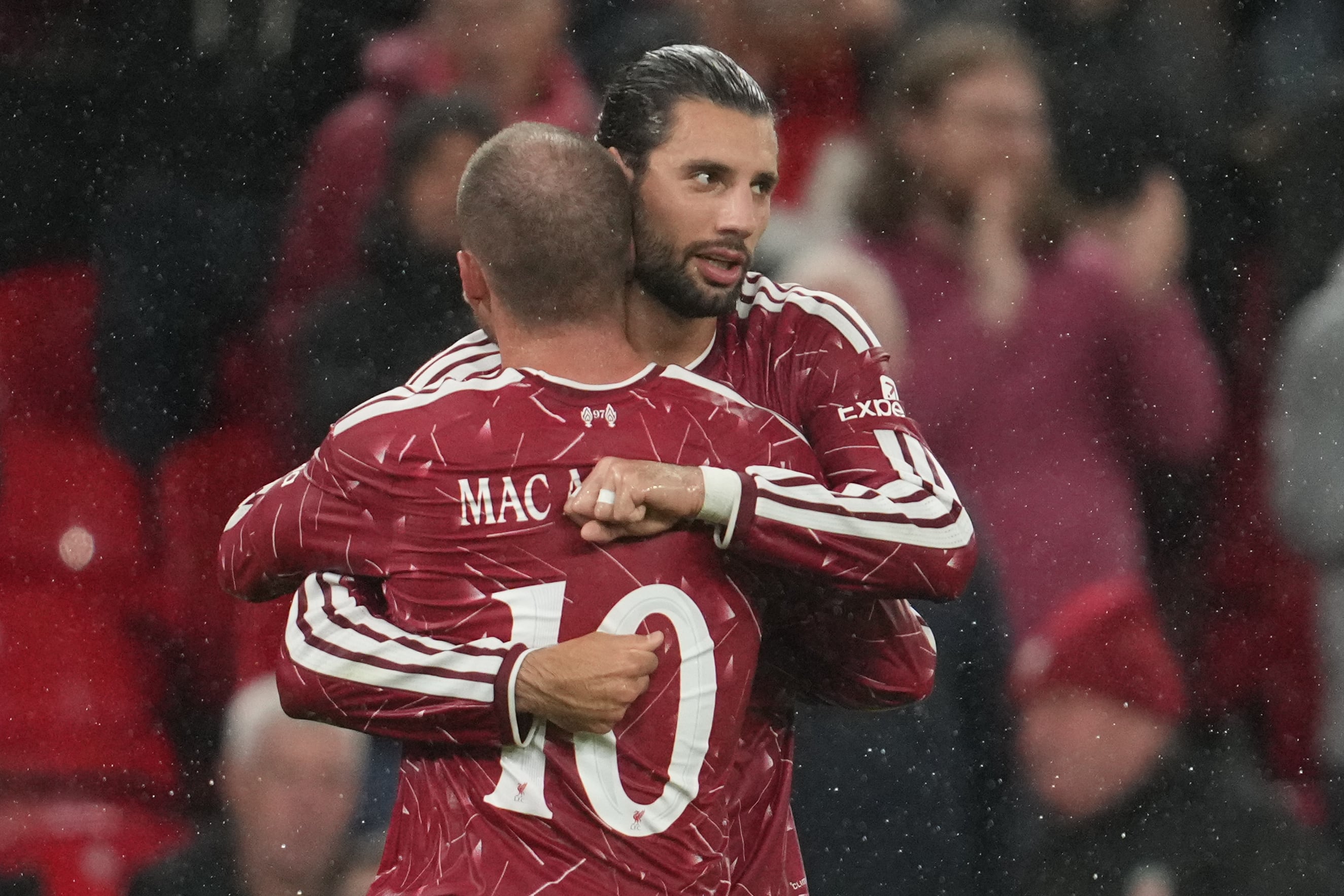 Tottenham's misery continues with loss at Liverpool in English League Cup. Arsenal cruises to win