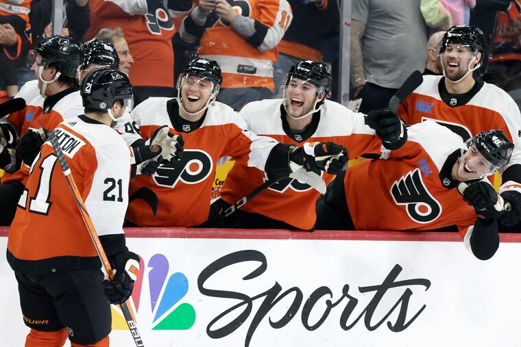 Flyers players greet # 21 Scott Laughton after he scored on a penalty shot in the third period of the Dallas Stars at Philadelphia Flyers NHL game at the Wells Fargo Center in Philadelphia on Thursday, Jan. 18, 2024.