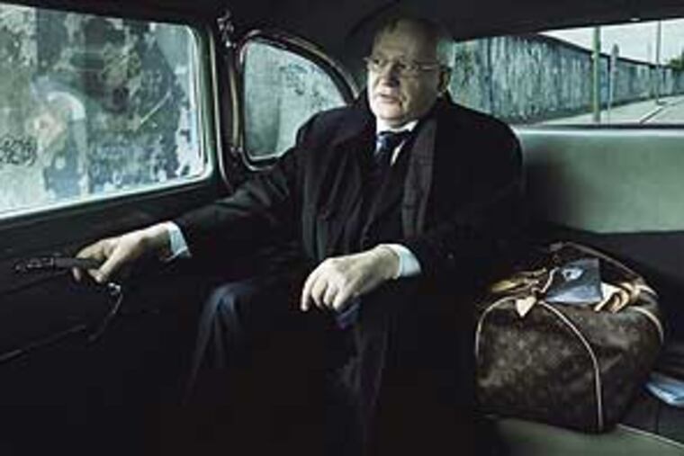 Gorbachev and Vuitton, maker of the pricey travel bag, are giving to green causes.