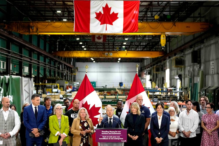 Francois-Philippe Champagne, minister of finance and national revenue, speaks at a news conference on Canada's response to U.S. tariffs, at a roofing company in Ottawa, on Tuesday, Aug. 25, 2026.