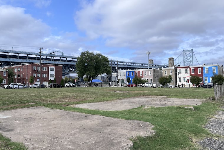 A view of the site of the former West Jersey Paper manufacturing site in North Camden, in the shadow of the Ben Franklin Bridge. The U.S. Environmental Protection Agency announced a $1 million grant August 29, 2024 to the nonprofit Camden Lutheran Housing Inc. for cleanup of the contamination of the property, which will become 15 affordable single family homes.