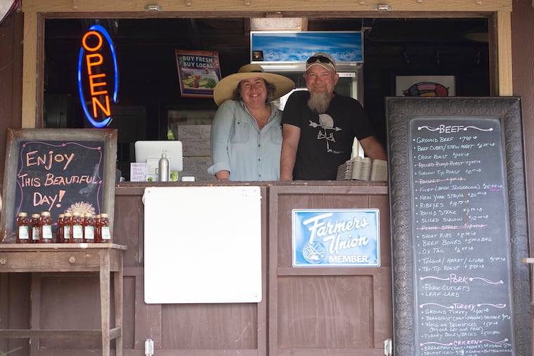 Karen and Michael Kovach, proprietors of Walnut Hill Farm stand at their business, Friday, May 21, 2021, in Sharpsville, Pa. Here are some proactive steps, to reduce your company’s tax liability. (Pam Panchak/Pittsburgh Post-Gazette via AP)
