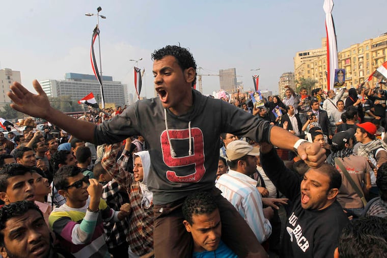 Egyptian protesters shout slogans against the interim prime minister, Gen. Abdel-Fattah el-Sissi, as they mark the second anniversary of one of the fiercest clashes between protesters and security forces.