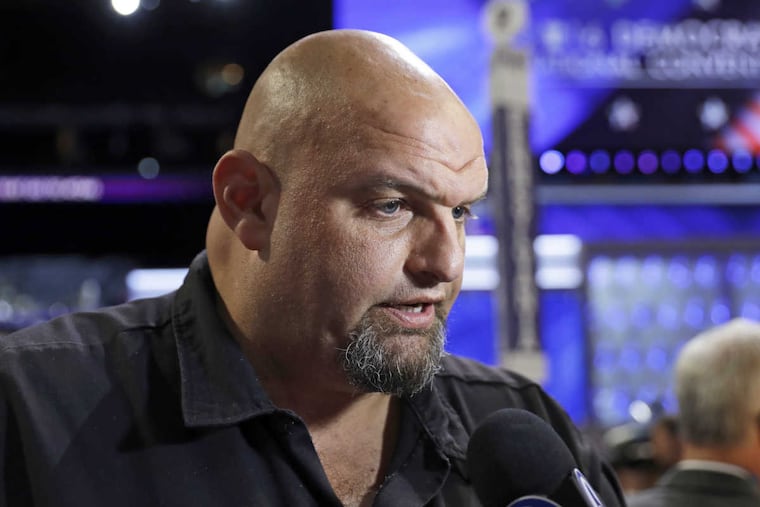 FILE – In this July 27, 2016, file photo, John Fetterman, mayor of Braddock, Pa., talks to a reporter on the third day of the Democratic National Convention in Philadelphia. On Tuesday, Nov. 14, 2017, Fetterman became the latest Democrat to announce he's willing to challenge incumbent Pennsylvania Lt. Gov. Mike Stack in the party's primary for the 2018 election.
