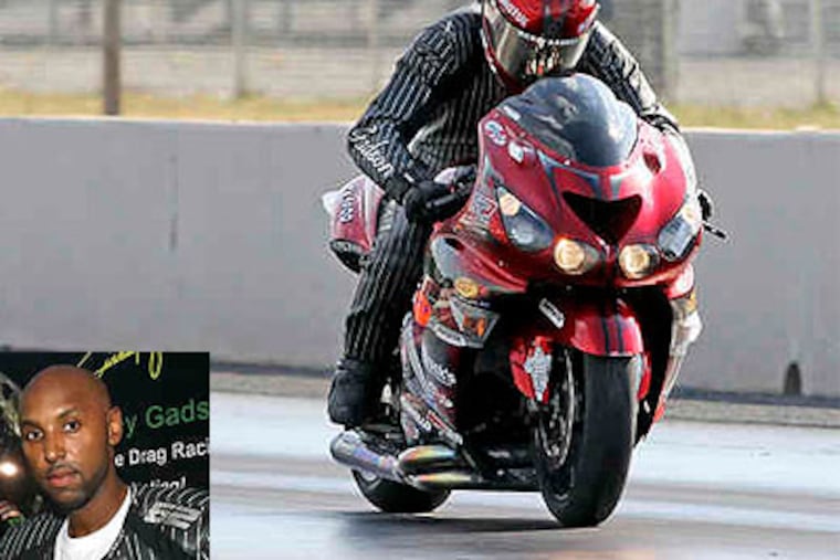 Philadelphia native Rickey Gadson (inset) hits about 170 mph at Atco Raceway. His nine national titles have earned him a worldwide reputation. (Steven M. Falk / Staff Photographer)