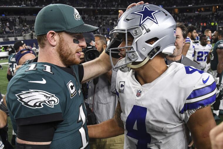 Carson Wentz meets Cowboys’ Dak Prescott after Eagles’ victory.
