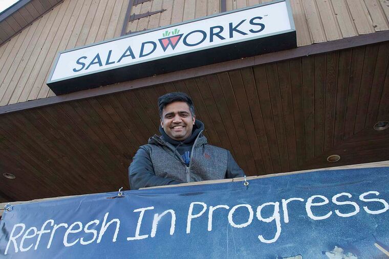 Nish Patel, a Saladworks franchisee, looks out from his business in Newtown. The renovation will include adding a WiFi bar. "This is what the new generation is attracted to," Patel said.
