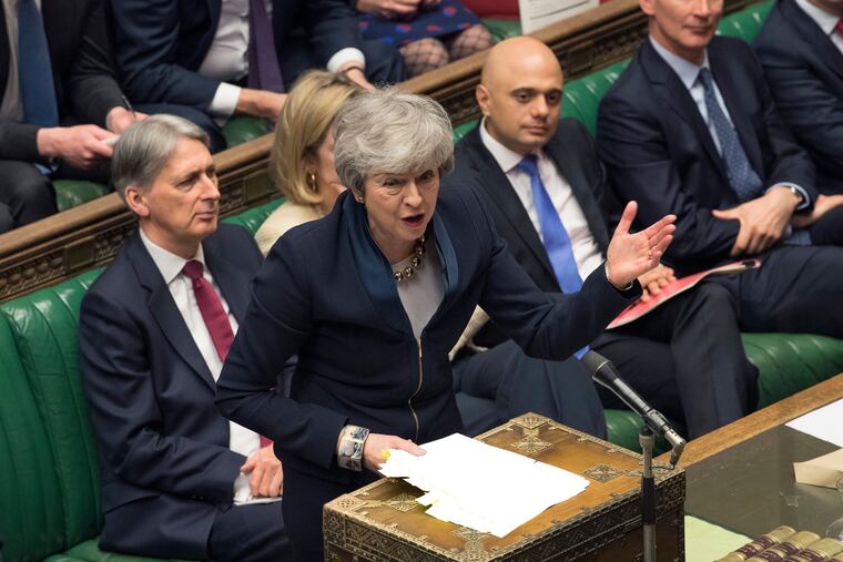 In this photo provided by the UK Parliament, Britain's Prime Minister Theresa May addresses MP's in the Palace of Westminster in London, Wednesday, April 3, 2019. A Brexit-related vote in Britain's House of Commons on Wednesday ended in a tie, the first time that has happened in a quarter-century. Under Parliament's rules, the speaker of the House has tie-breaking power. Speaker John Bercow cast his vote with the noes. He said that was in keeping with the principle that "it is not for the chair to create a majority that otherwise doesn't exist." (Mark Duffy/UK Parliament via AP)