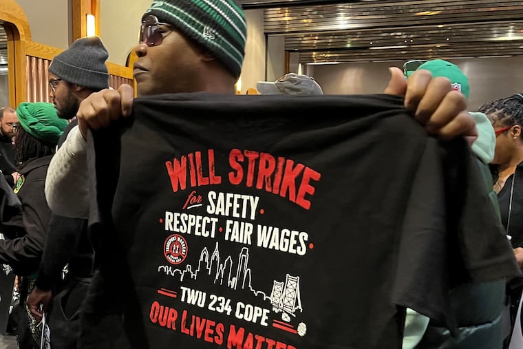 Members of Transport Workers Union Local 234 voted on Nov. 16 to authorize a strike as contract negotiations with SEPTA intensify. A worker displays this year's strike t-shirt.