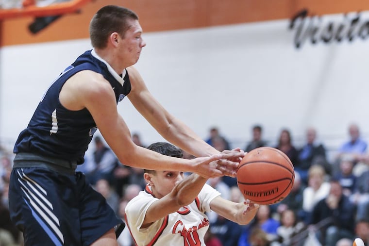 Shawnee's Dean Doll tries to keep the ball from Cherokee's Zach Morgan during the 2nd quarter in Marlton, NJ, Tuesday, December 19, 2017. . Shawnee beats Cherokee 70-51.