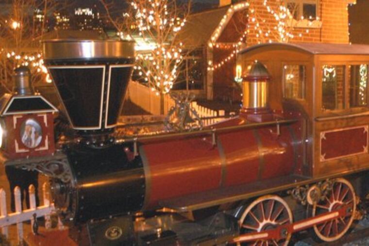 At Camden Children's Garden , Santa will arrive Saturday during the eighth-annual Holiday Festival of Lights.