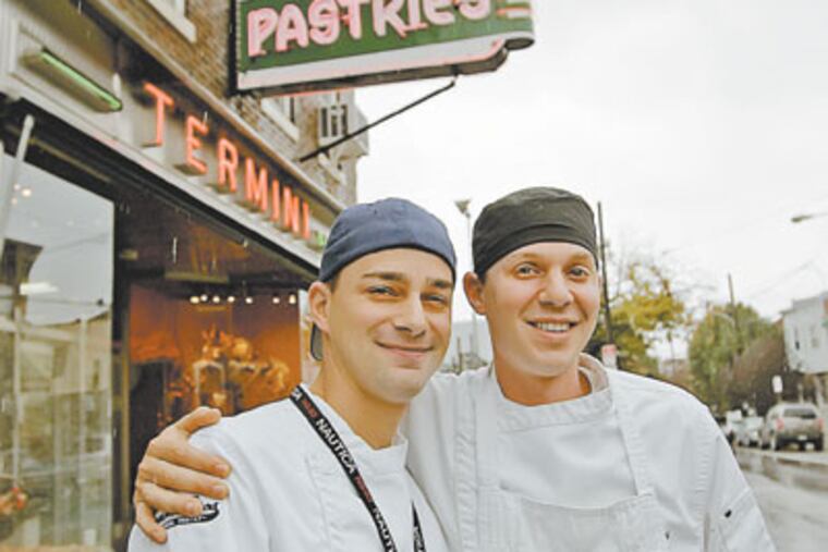 Vincent, left, and Joseph Termini in front of their family's store. Many Philadelphia small businesses like Termini Pastries are struggling in the tough economic climate. (Michael Bryant / Inquirer)