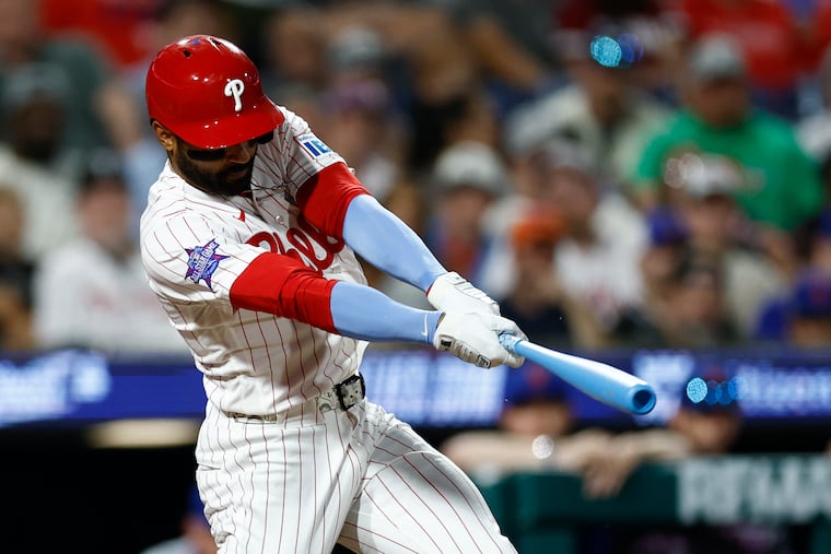 Derek Hill belts a sixth-inning single against the New York Mets on Sunday. His hit was one of nine on the night for the Phillies.