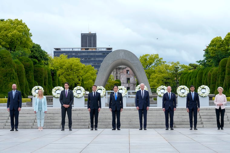 President Joe Biden (fourth from right) and other G7 leaders pose for a photo during a visit to the Hiroshima Peace Memorial Park in Hiroshima, Japan, on Friday.