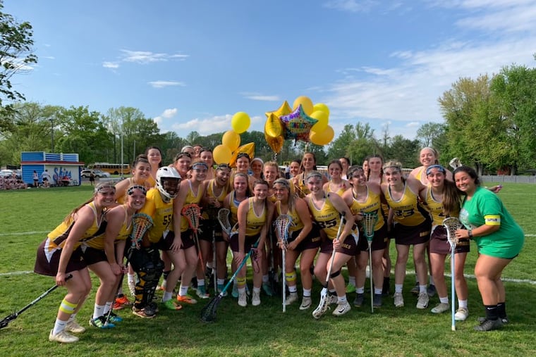 The St. Hubert girls' lacrosse team celebrates Sarah Hartigan's 166th career goal, breaking the school record of 163 by Emily Smith. ST. HUBERT / Handout