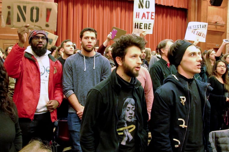 Middlebury College students turn their backs to Charles Murray (unseen) during his lecture in Middlebury, Vt., Thursday, March 2, 2017. New polling finds that America’s college campuses are seen as far friendlier to liberals than to conservatives when it comes to free speech.