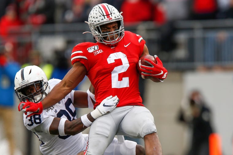 Penn State safety Lamont Wade pulls down Ohio State running back J.K. Dobbins in the first half of the Nittany Lions' loss in Columbus.