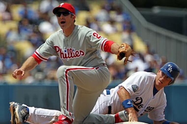 The Phillies failed to complete a three-game sweep of the Dodgers in Los Angeles. (Reed Saxon/AP)