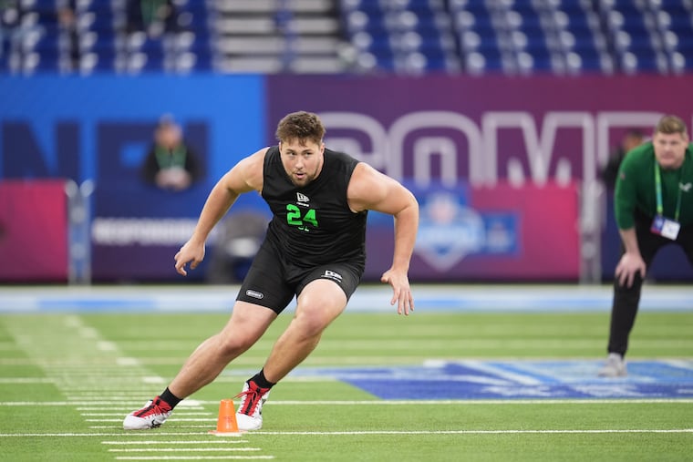 Georgia offensive lineman Monroe Freeling (24) runs a drill at the NFL Scouting Combine on March 1.