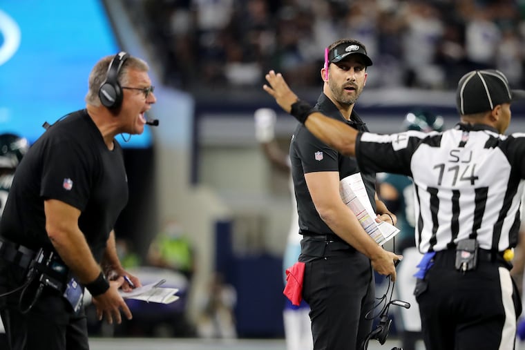 Eagles coach Nick Sirianni (right) did not confirm recent speculation that Jeff Stoutland (left) would return, and Stoutland himself recently threw cold water on the notion.