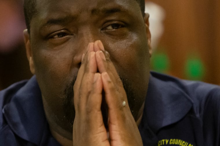 In this file photo, Councilman Kenyatta Johnson listens to business owners during a rally in support of keeping Hoa Binh Plaza in South Philadelphia.