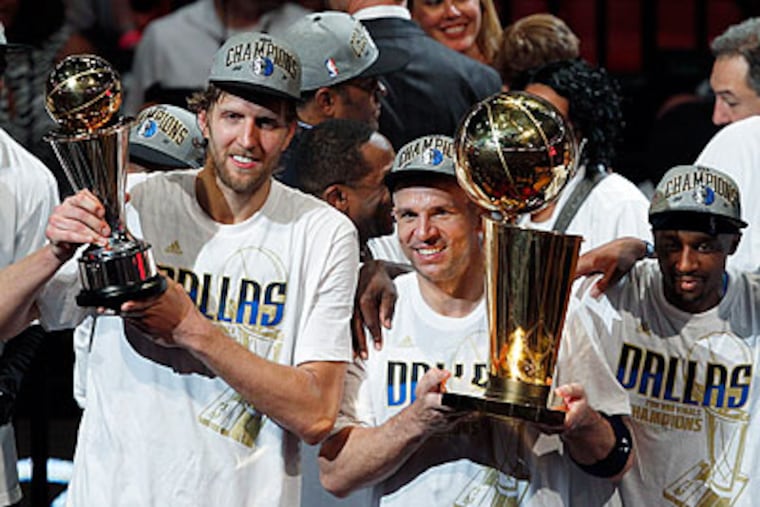Dirk Nowitzki (left) was named the NBA Finals MVP after the Dallas Mavericks won their first ever championship. (Wilfredo Lee/AP)
