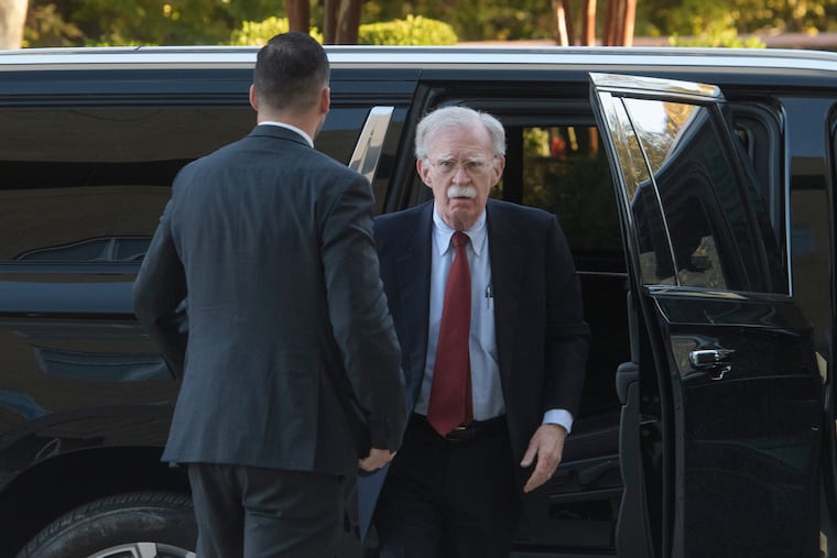 Former Trump administration national security adviser John Bolton, arrives for his arraignment at the Greenbelt Federal Courthouse in Greenbelt, Md. on Friday.