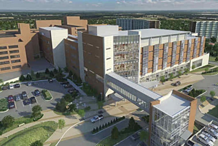 This artist's conception shows the new five-story pavilion, in front of the existing hospital, connected to the new parking garage by an enclosed pedestrian bridge. Groundbreaking is scheduled for this week.