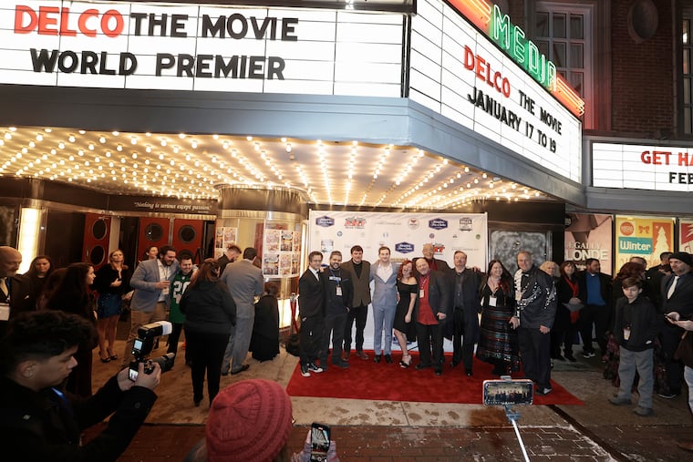 The cast of "Delco: The Movie" poses for a photo during the film's red carpet premiere on Friday at the Media Theatre.