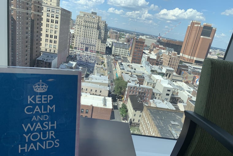 This sign in a Center City medical-office-tower waiting room urges calm nerves and clean hands as the region attempts to fully enter GREEN re-opening phase amid the coronavirus pandemic on Monday, June 29, 2020.