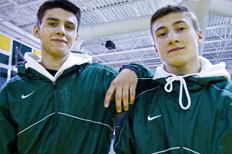 Clearview H.S. wrestlers (right) Mike Van Brill, 126 lbs. and his
brother John, 145 lbs. (David Swanson/Staff Photographer)