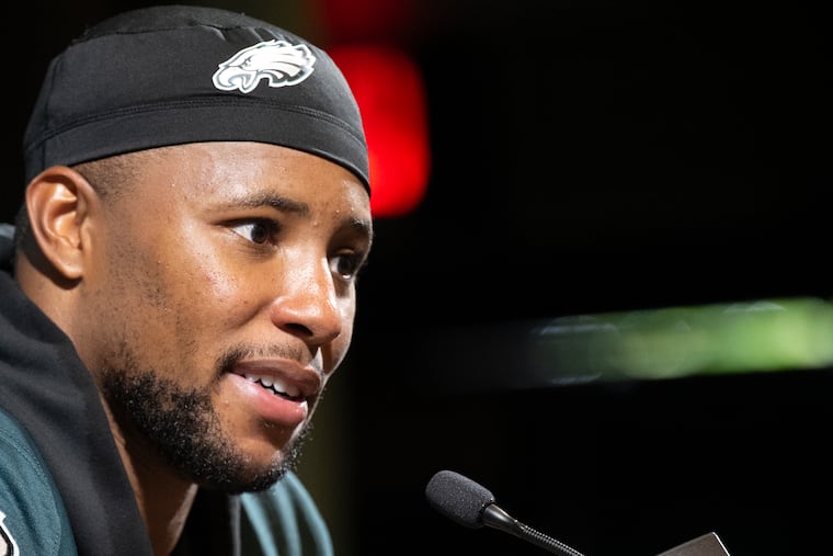 Eagles running back Saquon Barkley talks with reporters after practice in May in South Philly.