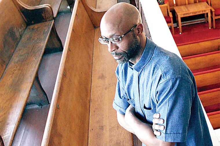Rev. Larry G. Patrick, of Redeem Baptist Church, is seen inside his church in the Strawberry Mansion section of Philadelphia on May 6, 2014.
(David Maialetti/Staff Photographer)