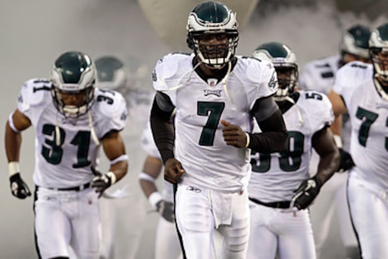 Michael Vick and the Eagles have agreed to a 6-year deal worth $100M. (David Maialetti / Staff Photographer)