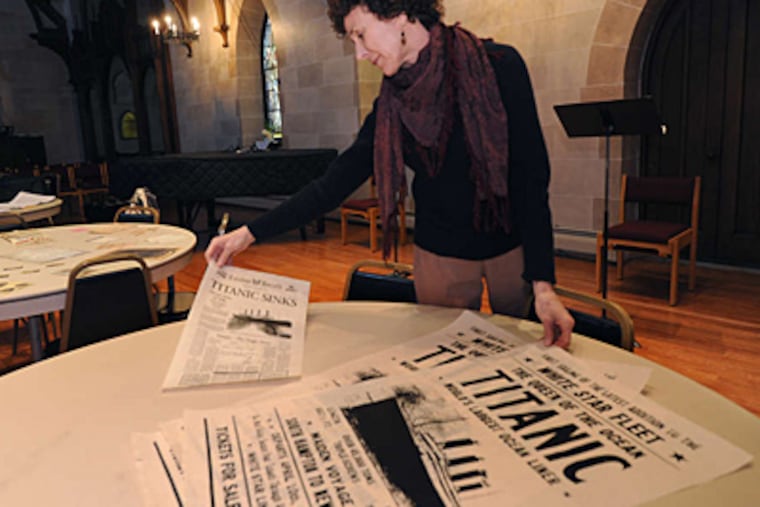 Kate Mallon-Day looks over posters. She sings in a show this weekend at St. Paul's Episcopal Church in Elkins Park memorializing the Widener family, who lost two members on the Titanic. APRIL SAUL / Staff Photographer
