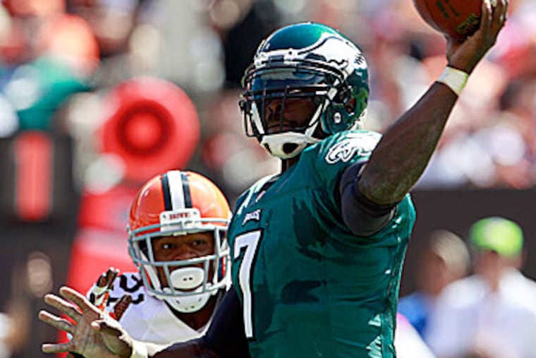 Michael Vick threw four interceptions in the Eagles' 17-16 win in Cleveland. (Yong Kim/Staff Photographer)