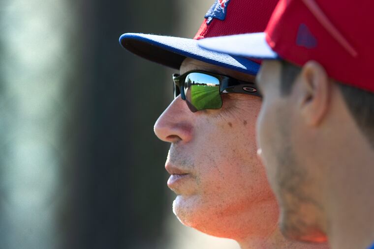 Phillies manager Joe Girardi watching drills Tuesday in Clearwater, Fla.