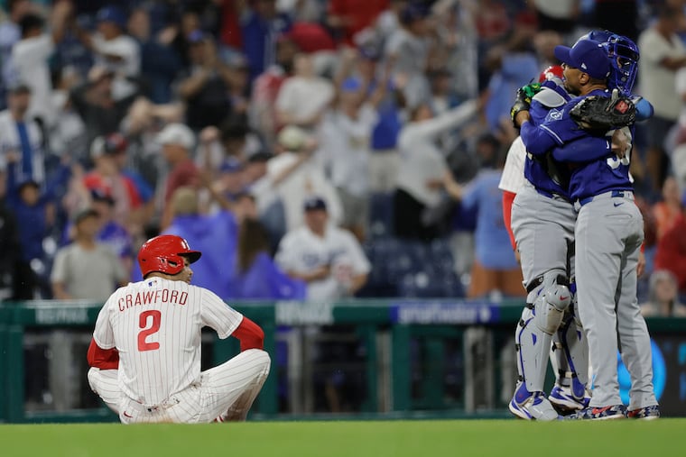 Justin Crawford (left) was caught in a rundown that lead to a game-ending double play.