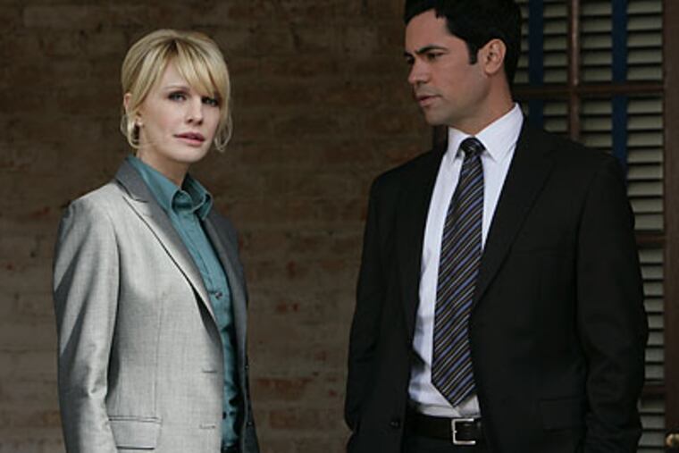 Kathryn Morris (left) and Danny Pino star in "Cold Case."