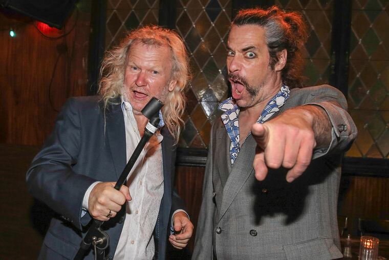 Fergus Carey, owner of Fergies Pub, left, with Scott Johnston, curator of the Fringe Festival’s Late Night Cabaret.