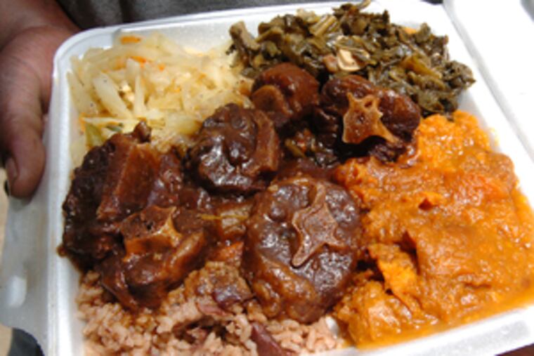 A platter of stewed oxtails , marinated overnight and simmered for two hours.