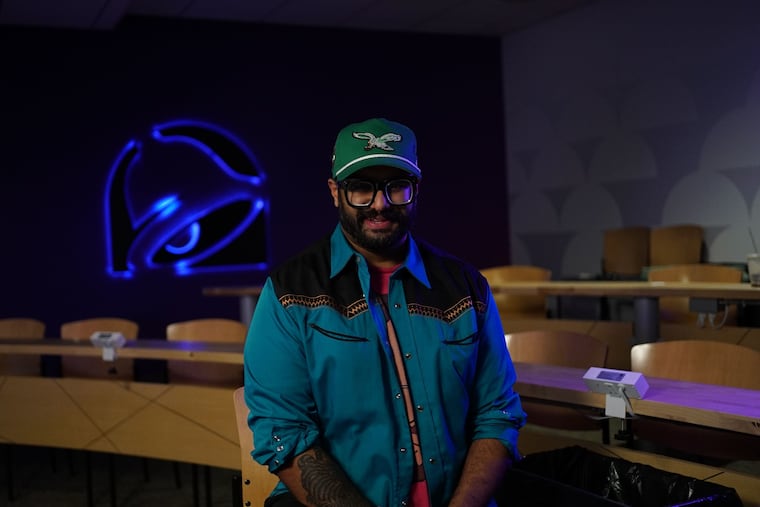 Philadelphia-based chef Reuben Asaram poses in Taco Bell's corporate headquarters in California. The fast-food chain tapped Asaram to create a limited edition Crunchwrap Supreme, which Asaram says will include Indian influences.