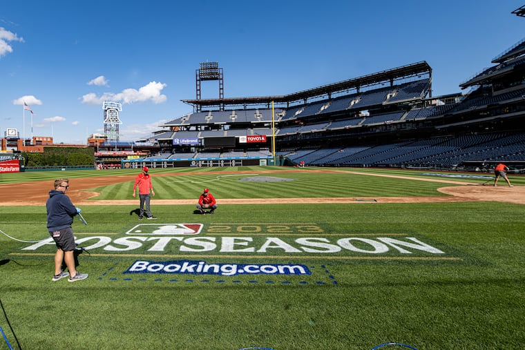 Phillies ground crew prepare the field at Citizens Bank Park ahead of Game 3 against the Atlanta Braves Wednesday night. The NLDS is currently tied 1-1.