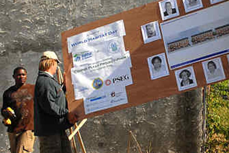 Camden Metro Habitat for Humanity is building nine homes in the Cooper Plaza section. The project was chosen by HUD to highlight World Habitat Day, a United Nations housing initiative. (Tom Gralish / Staff)