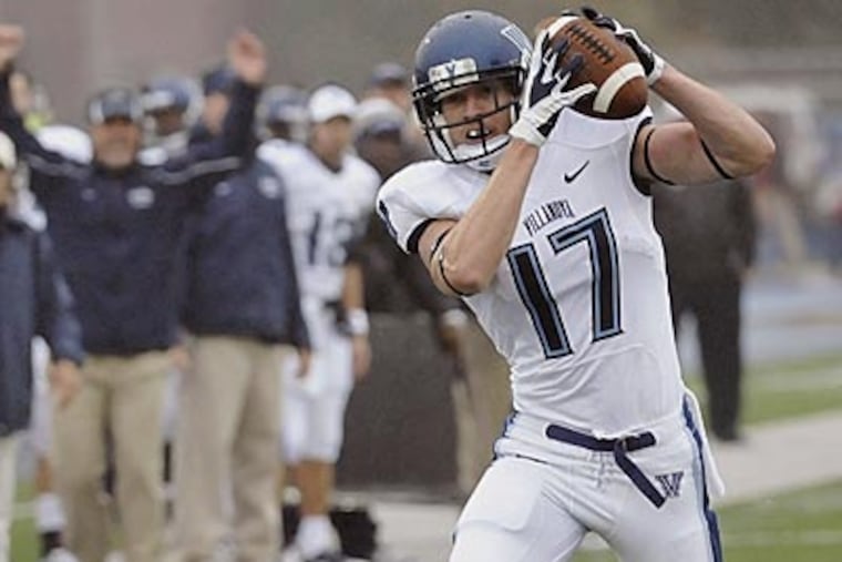 Villanova wideout Joe Price hauls in a pass for a touchdown against Maine. (Michael C. York/AP)