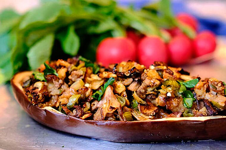 A hearty baked mushroom-stuffed eggplant is a nice side dish for lamb or chicken and offers a flavorful and filling vegetarian option to the menu. ( Ed Hille / Staff Photographer )