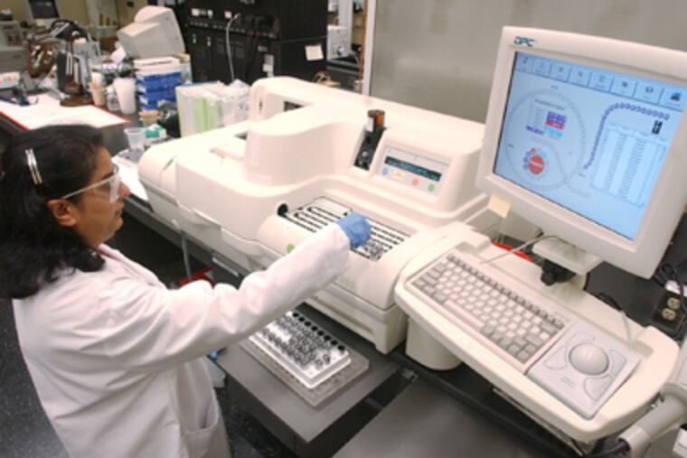 A researcher for BD (Becton Dickinson) in Franklin Lakes, N.J., a holding of fund manager Donald G. Taylor. (Mike Derer / Associated Press)
