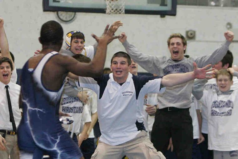 Dechlin Moody (center), here as an assistant in 2008, is nowthe head coach at Collingswood, his alma mater.