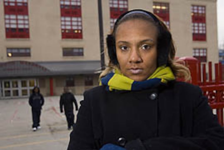 Gereka Bracey, at Thurgood Marshall Elementary School. Her son Diontay Boone was bullied and taped at the school. (Jessica Griffin / Philadelphia Daily News)